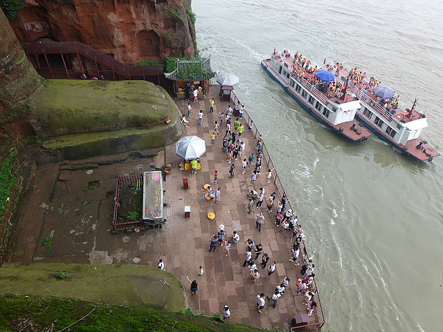 Tour boats make a stop in front of the Big Buddha
