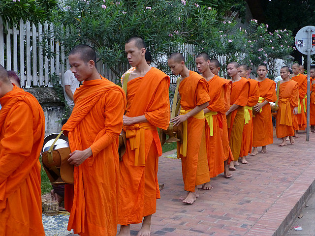 Monks receiving alms