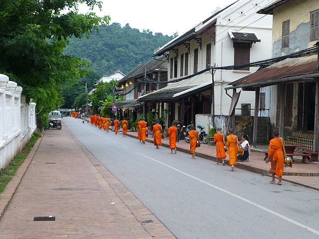 Monks receiving alms