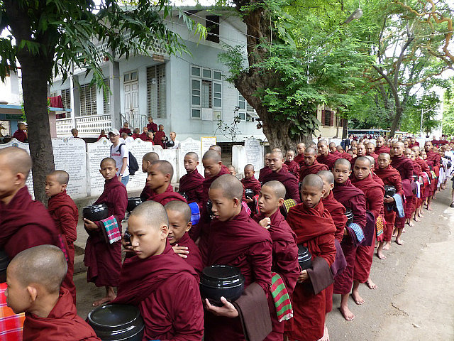 Monks lining up to enter the dining hall-Amarapura
