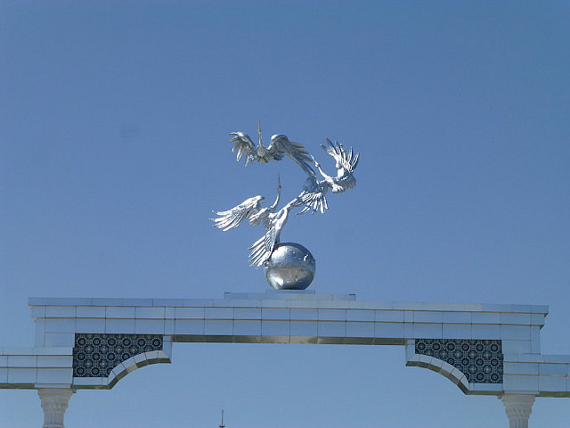 Closer look at the pelicans on the gate