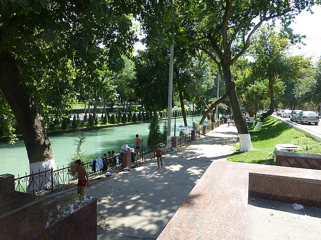 Locals cool off by diving into Ankhor canal