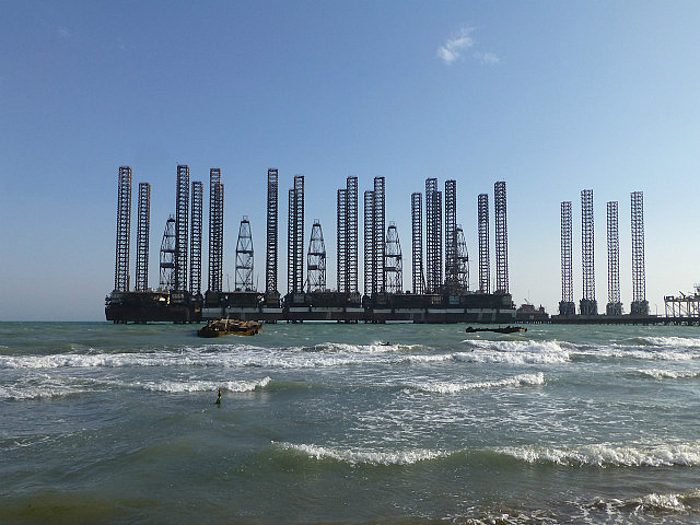 Out of commission oil rig brought close to shore