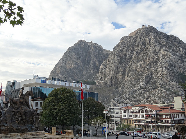 High ridge capped by a citadel looms over the town
