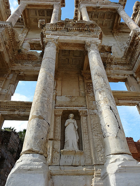 One of 4 statues at facade of the Library