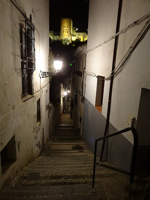 Albayzin street with Alhambra in the distance
