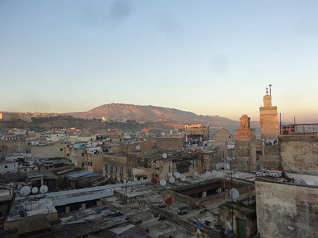 Rooftop view of Fes medina at sunset