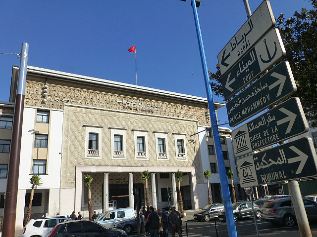 Government building and road signs