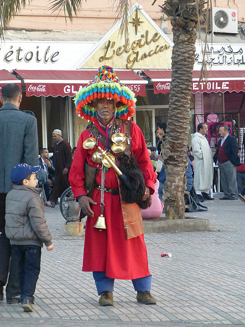 Water carrier in traditional costume