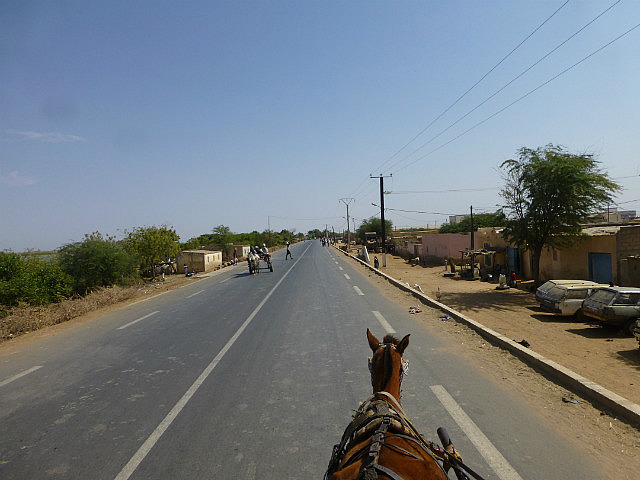 Horse cart to the highway