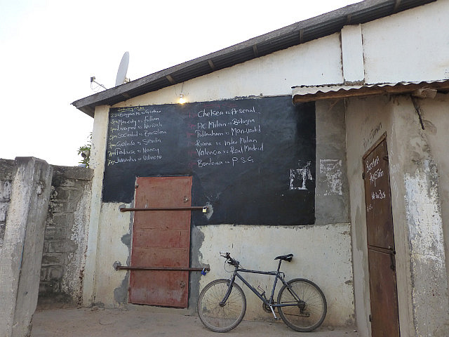 Football game schedule listed on the street