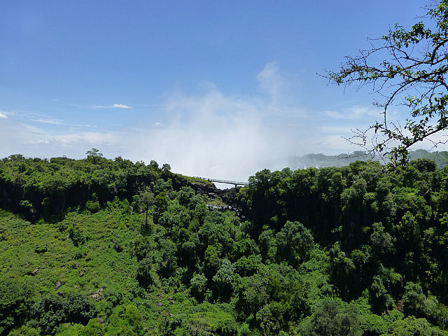 Spume from Vic Falls rises up in the air