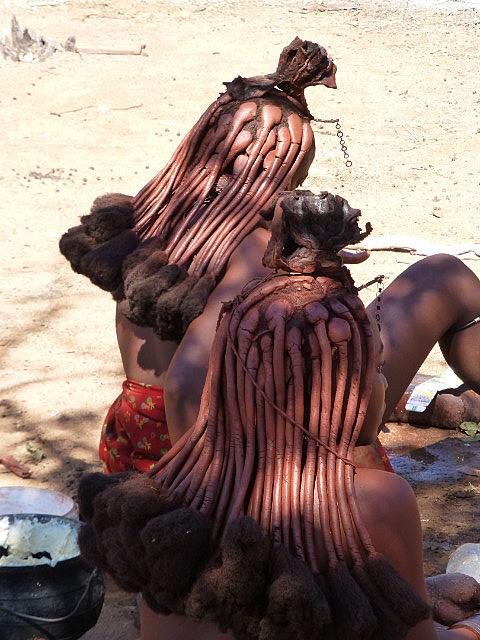 Carefully braided tresses of the Himba women