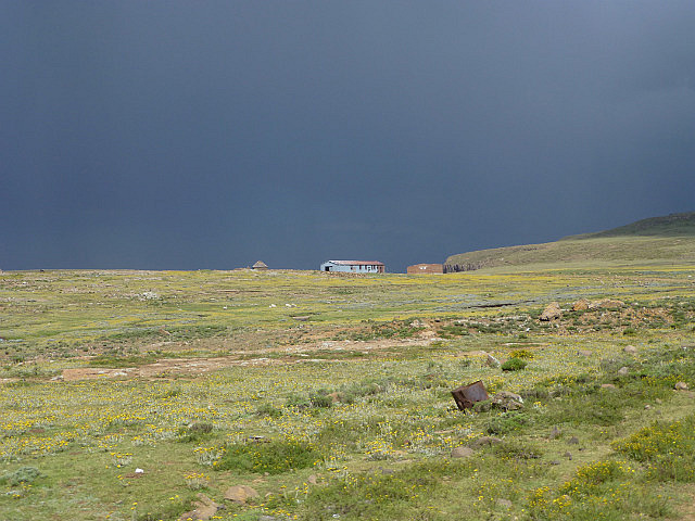 Distant house in the mountains