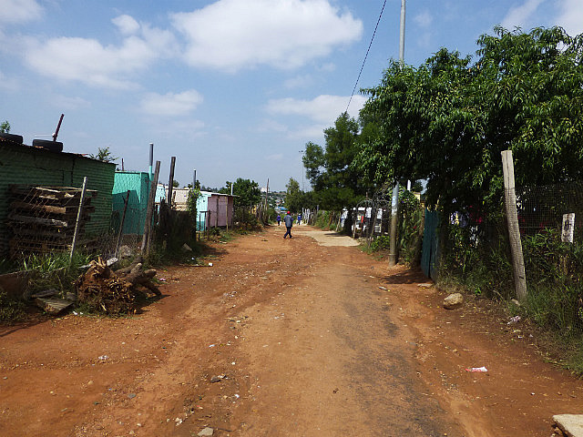 Dirt road at a new Soweto settlement