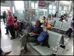 Catching up on offline work at Kunming Bus Station