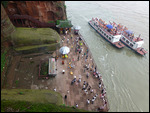 Tour boats make a stop in front of the Big Buddha