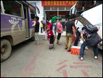 Hani woman at Xinjie bus station
