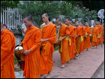 Monks receiving alms