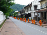 Monks receiving alms