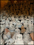 Collection of Buddha images damaged during the war