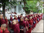 Monks lining up to enter the dining hall-Amarapura