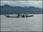 Fishermen with conical nets