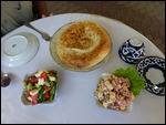 Non (nan) bread and Greek salad