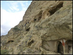 M hauling herself up into a cave in Ubadno