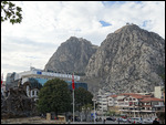 High ridge capped by a citadel looms over the town
