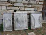 Relief sculpture specifying the wares being sold