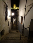 Albayzin street with Alhambra in the distance