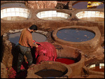 Scrapping and shearing leather at the tannery