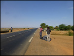 Waiting on the highway for a bus to Saint-Louis