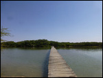 Traversing a boardwalk takes you to the island