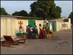 Women at the water pipe at Tanji