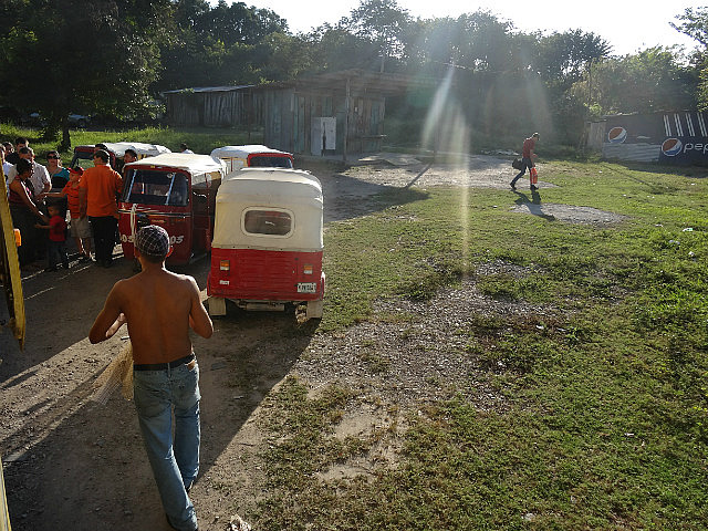 Town enroute - Bajajs waiting to pickup