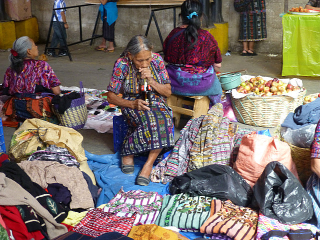 Solola Market - Lady enjoying Coca Cola