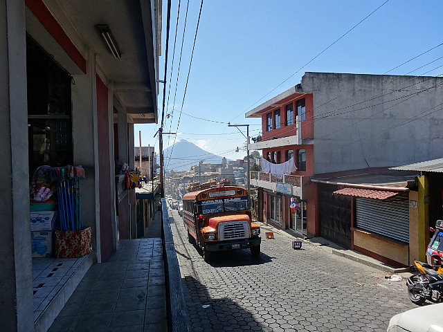 Chicken bus climbing up the main street, Solola
