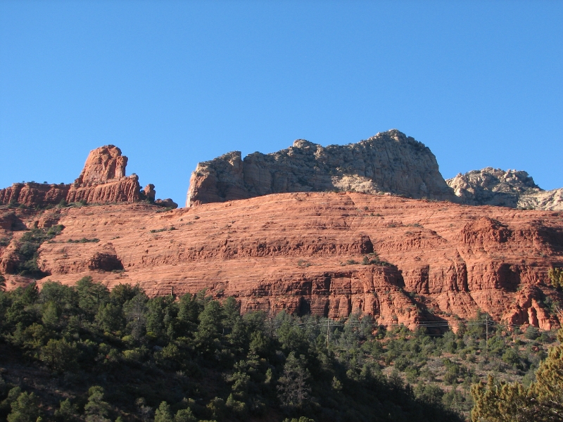 IMG_0802.JPG - In this grand geological garden, brightly banded mesas, buttes and spires flank the town on all sides, thrusting to heights of more than 2,000 feet from the valley floor