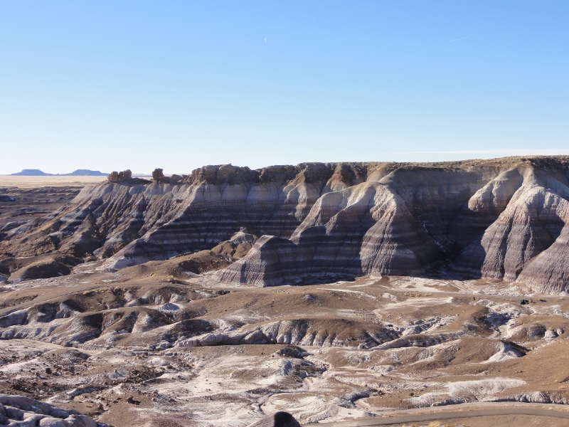 DSC02264.JPG - The mudstone cliffs have been sculpted by the combined erosive effects of strong winds and occasional downpours. Heavy erosion is the the rule, as much as 3 inches of clay may wash away from the surface in 10 years.