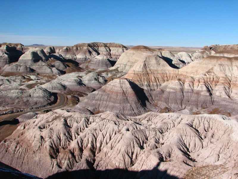 IMG_0979.JPG - This area features other worldly, almost lunar landscapes with wildly sculpted hills and striated rocks.  The signature bands of the badlands of the park result from the sedimentary layers deposited in the area.