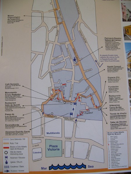 P1090378.JPG - Map of the 20 murals which are marked by the red-dashes. There is significant elevation difference between the ones at top left and the ones at bottom, which are almost at the level of El Plan (the lowlying area of the city). Several hundred steps were encountered during the self-guided tour that lasted about an hour.