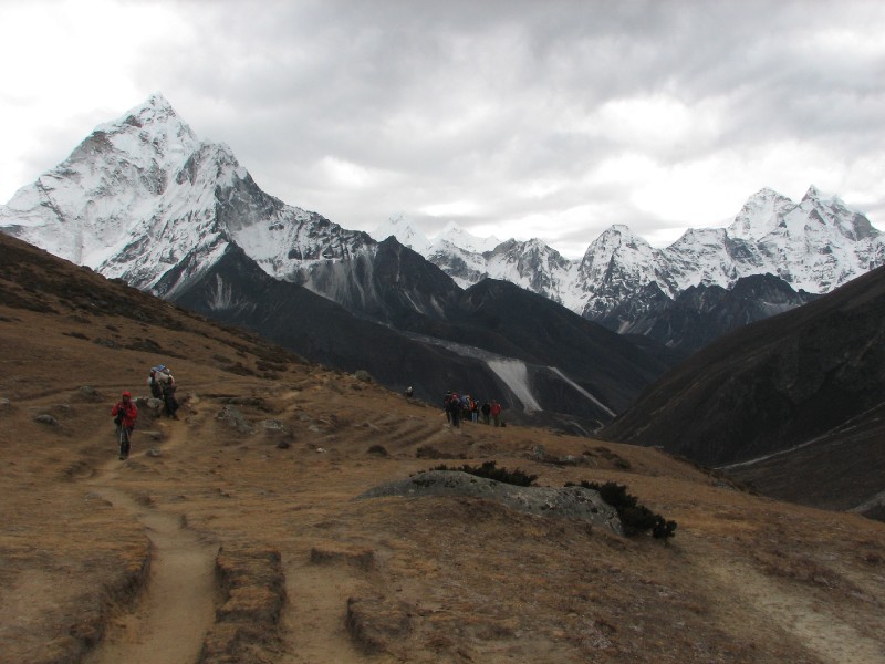 IMG_8235.jpg - Ama Dablam and the Kang Tega range (looking south) and the trail coming from Dingboche (Venkatesh in red jacket)