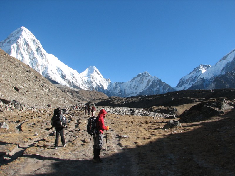 IMG_8248.jpg - Pumori (left), porter and Venkatesh (fully wrapped up)