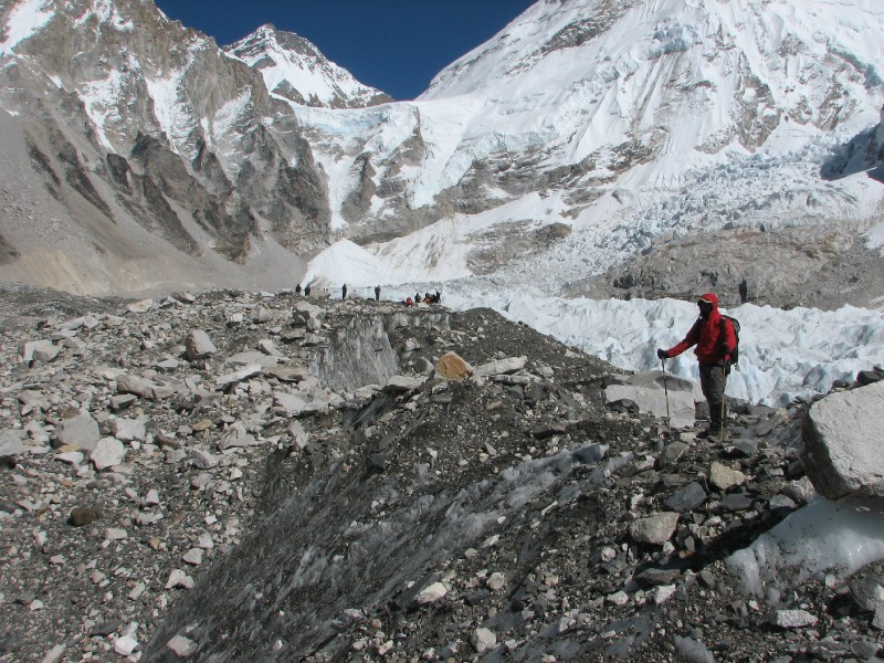 IMG_8283.jpg - Venkatesh standing on the Khumbu Glacier. Trekkers in the distance at the Everest Base Camp