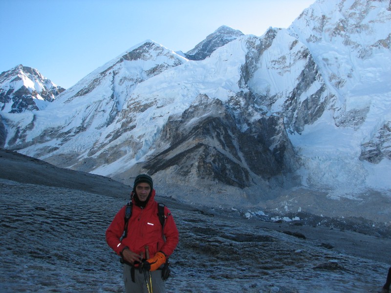 IMG_8299.jpg - It was difficult to take pictures as it involved removing 2 layers of gloves, sun glasses and finally balancing the poles. But this is Everest that just appeared through the gap
