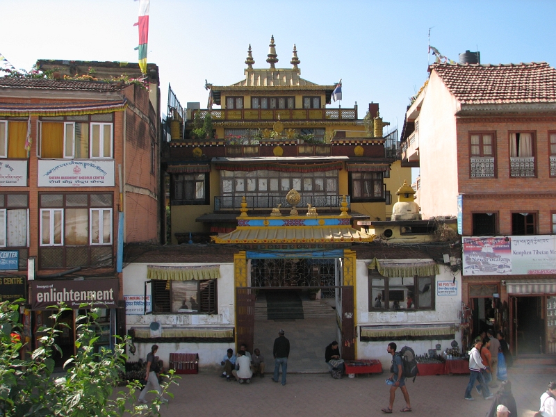 IMG_8458.JPG - A number of monasteries (or gompas) have been built around the main stupa, some of them richly decorated interiors with some fine paintings and thangkas. Apart from local Tibetans and Nepalis, there is a sizeable community of foreign Buddhist students living here.